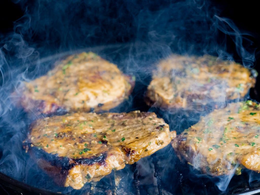 Mongolian marinated pork chops on the grill.